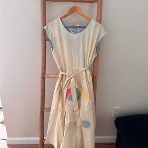 Elegant Cream Midi Dress with Colorful Accents